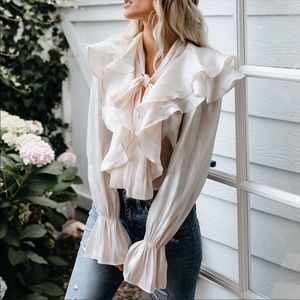 Ruffle statement blouse